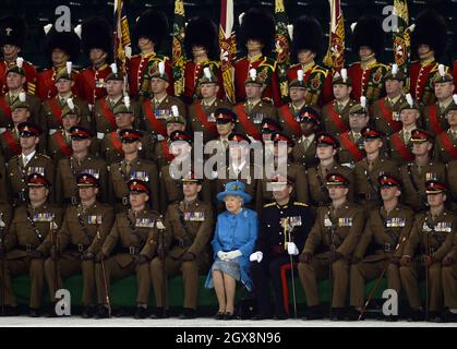 Queen Elizabeth attends a ceremony to present new colours to the Royal Welsh Regiment at the Millennium Stadium in Cardiff on June 11, 2015.  Stock Photo