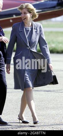 The Countess of Wessex during her visit to the Orbis DC-10 hospital plane at Stansted Airport in Essex, Friday April 4, 2003, where she boarded the flying eye hospital for the launch of her new role as patron of Vision 2020: The Right to Sight. Full length, gery dress, royals, smiling, hand bag  Â©Anwar Hussein/allaction.co.uk  Stock Photo