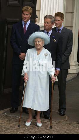 Princes William and Harry with the Prince of Wales and the Queen Mother outside Clarence House on her 101st Birthday, August 2001.  Photo.  Anwar Hussein  Stock Photo