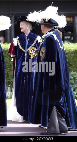 Queen Margrethe II of Denmark, wearing ceremonial robes, attends the Order of the Garter, at Windsor. Full length,  royalty.  Stock Photo