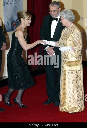 Madonna meets Her Majesty Queen Elizabeth II at the World Premiere of the James Bond film Die Another Day held at London's Royal Albert Hall. full length. curtsey. black dress. hand shake. jewellery. white gloves. funny. fashion.  NO UK SALES FOR 3 MONTHS FROM 181102  Stock Photo