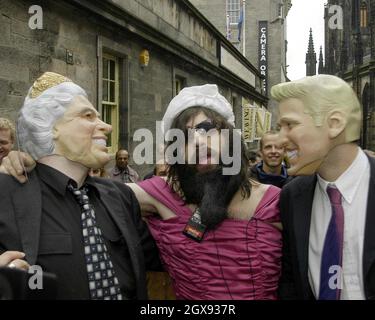 Aaron Barschak at Edinburgh Castle for the Fringe Festival.   The comedian dressed with an Osama bin Laden wig made many attempts at breaking the security to get into the castle, even boarding a coach fall of Italien Tourists.  Barschak last month did break through major secuirty when he slipped past officers while in fancy dress and managed to get into Prince Williams 21st birthday party and kissed him on the cheek.  Funny  Â©Tony Haresign/allaction.co.uk  Stock Photo