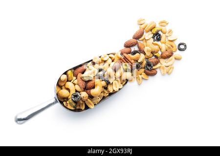 Mix of salted nuts in sccop isolated on white background. Stock Photo