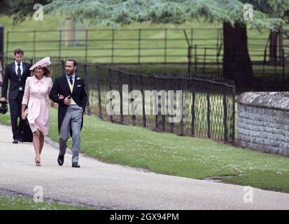 Carole Middleton and James Middleton arrive for the wedding of Pippa