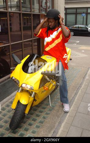 Wyclef Jean leaving Radio One before attending the Notting Hill Carnival, London.  Dreadlocks, motorbike. Â©Morrison/Huckle/allaction.co.uk  EXCLUSIVE PICTURES NOW GOING ALL ROUND  Stock Photo