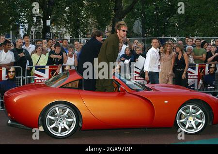 Paul Kaye and Johnny Vegas arrive in a car to the film premiere of 'BLACKBALL' in Leicester Square. Stock Photo