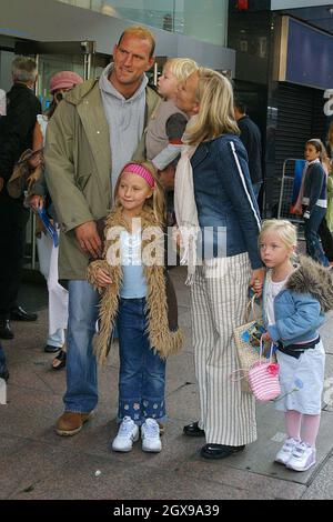Lawrence Dallaglio and his family at the Premiere of Finding Nemo at ...