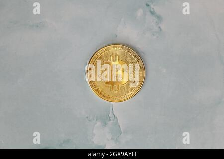 Golden Bitcoins Cryptocurrency top view stack of Digital coins on gray marble desk table background.Flat lay blank text.Copy space for word. concrete Stock Photo
