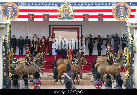 Queen Elizabeth II (left) and the Duke of Edinburgh (right) stand alongside America's President George Bush and his wife Laura as they watch members of the Household Cavalry parade on the forecourt of Buckingham Palace. Â©Anwar Hussein/allactiondigital.com  Stock Photo