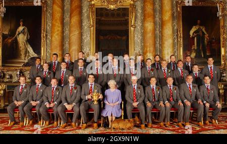 Britain's Queen Elizabeth II poses with the England rugby squad at a reception at Buckingham Palace in London to celebrate winning the Rugby World Cup. Earlier the squad had paraded the trophy through the West End in a procession of open-topped buses.   Â©Anwar Hussein/allactiondigital.com  Stock Photo