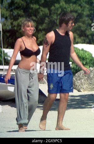 Liam Gallagher and Nicole Appleton enjoying a holiday in the Florida Keys. bikini,sunbathing  Stock Photo