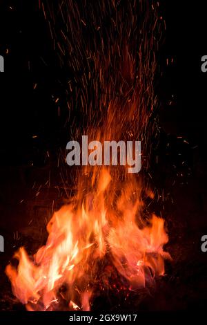Traditional blacksmith furnace with burning fire Burning fire in furnace at forge, workshop. Blacksmith equipment concept Stock Photo