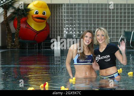 Jodi Albert and Ali Bastian at the Holly-Soaks! make a splash for butlins swimathon 2004 at the Carlton Hotel in London. Stock Photo