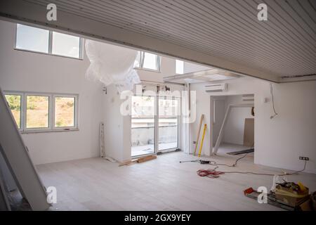 Interior doors stacked in a new apartment waiting for installation Stock Photo