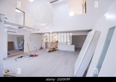 Interior doors stacked in a new apartment waiting for installation Stock Photo