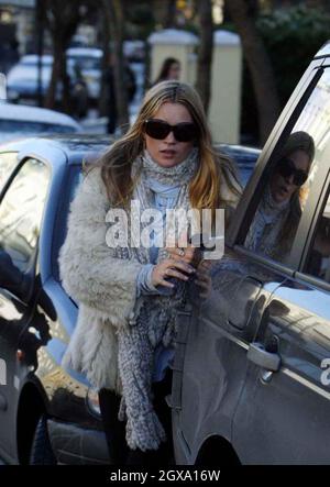 Kate Moss wrapped up warm whilst out and about in freezing West London. Stock Photo