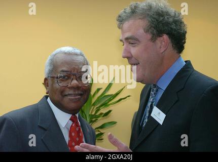 Broadcaster Sir Trevor McDonald and TV presenter Jeremy Clarkson in conversation during a visit by Britain's Queen Elizabeth II to Douglas House, a respite care home for young people with life-limiting genetic conditions, Oxford. The Queen toured the home and looked at various facilities including the spa room, sensory room and music room before officially opening the house with a plaque unveiling. Â©Anwar Hussein/allactiondigital.com  Stock Photo