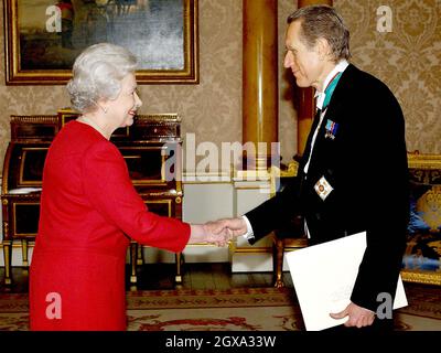 Queen Elizabeth II receives the ambassador of Italy, Signor Giancarlo Aragona, at Buckingham Palace in London.  Stock Photo