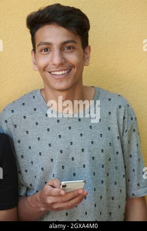 middle eastern trendy student or young business man portrait Stock Photo