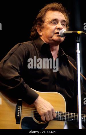 Country singer Johnny Cash performing live at the 1994 Glastonbury festival.  Stock Photo