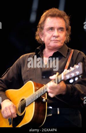 Country singer Johnny Cash performing live at the 1994 Glastonbury festival.  Stock Photo