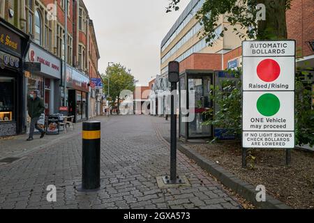 Automatic bollards at the pedestrianised shopping centre on Gold street, Kettering, England. Stock Photo
