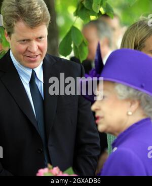 Earl Spencer, brother of the late Princess Diana (L) greets Queen Elizabeth ll at the unveiling of a fountain built in memory of Diana, Princess of Wales, in London's Hyde Park. The Â£3.6 million creation at the side of the Serpentine has been surrounded by controversy - facing delays and over-running its budget by Â£600,000. The Princess died in a car crash in Paris in August 1997.   Stock Photo