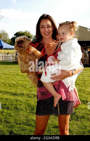 Tamara Mellon (Jimmy Choos) with her daughter Minty and dog Biscuit at the Macmillan Dog Day in aid of Macmillan Cancer Relief, at the Royal Hospital Chelsea, London. Stock Photo