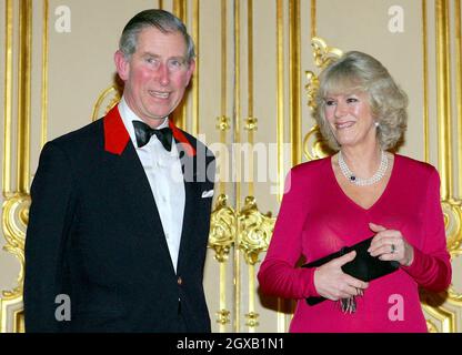 Prince Charles and Camilla Parker Bowles arrive for a party at Windsor Castle after announcing their engagement earlier 10 February, 2005.  Britain's Prince Charles and his longtime companion Camilla Parker Bowles are to marry, his office announced Thursday, putting the official seal on a relationship that first blossomed 35 years ago.       Stock Photo