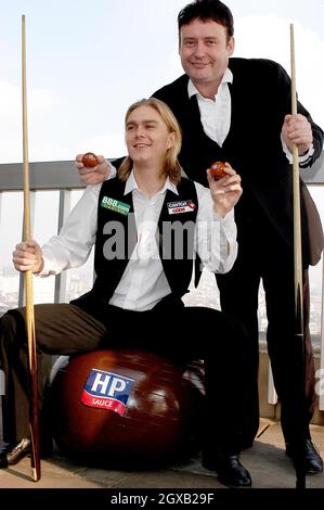 British snooker champions, Jimmy White and Paul Hunter, pose at the Sports Cafe, Haymarket, London on 8 February to celebrate HP's official sponsorship of the brown ball in this year's Masters snooker tournament.  Jimmy White has formally changed his name by deed poll to Jimmy Brown.  Stock Photo