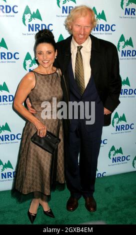 Julia Louis-Dreyfus and Brad Hall at the annual NY 'Forces for Nature' Gala Event for Natural Resources Defense Council.     Stock Photo