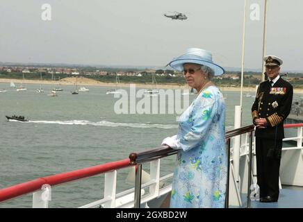 Queen Elizabeth II aboard HMS Endurance on her way to review the fleet.  A total of 167 ships from the Royal Navy and 35 nations are taking part in the International Fleet Review at Spithead, off Portsmouth, as part of the Trafalgar 200 celebrations this week. Anwar Hussein/allactiondigital.com  Stock Photo