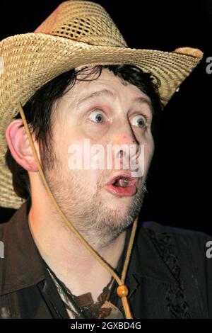A toothless Shane MacGowan (X The Pogues) performing at The Village, Dublin on 27/06/2005. Shane smoked which is prohibited under Irish law in pubs & restaurants. Stock Photo