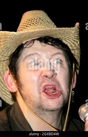 A toothless Shane MacGowan (X The Pogues) performing at The Village, Dublin on 27/06/2005. Shane smoked which is prohibited under Irish law in pubs & restaurants. Stock Photo