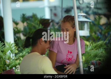 Julio Iglesias Jr, brother of Enrique, and a blonde female, out together in Miami.   EXCLUSIVE PICTURES BY ALL ACTION Stock Photo