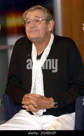 PHOTOGRAPHER HELMUT NEWTON WITH A RETROSPECTIVE OF HIS IMAGES SHORTLEY