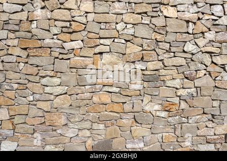 Old Stone wall. Ideal for textures and backgrounds. Stock Photo