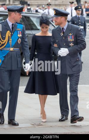 Prince William, Duke of Cambridge, Prince Harry, Duke of Sussex and Meghan, Duchess of Sussex attend a service to commemorate the centenary of the RAF (Royal Air Force) at Westminster Abbey in London on July 10, 2018. Stock Photo