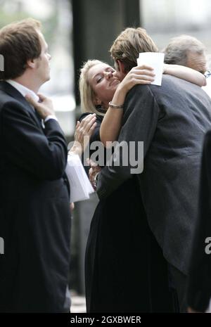 Tom Parker Bowles greets his sister Laura Lopes with a kiss at St Paul's Church in Knightsbridge, London for a memorial service for their grandfather Major Bruce Shand on September 11, 2006. Anwar Hussein/EMPICS Entertainment Stock Photo