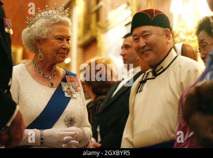 Queen Elizabeth II meets the Mongolian Ambassador as she hosts a reception at Buckingham Palace for members of the diplomatic corps on November 21, 2006. Anwar Hussein/EMPICS Entertainment  Stock Photo