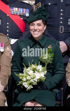 The Duchess of Cambridge attends the traditional Irish Guards St.Patrick's Day Parade at Cavalry Barracks in Hounslow Stock Photo