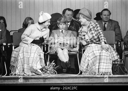 Queen Elizabeth II, Prince Edward and Queen Elizabeth, the Queen Mother attend the Braemar Highland Games on Scotland on September 01, 1975 Stock Photo