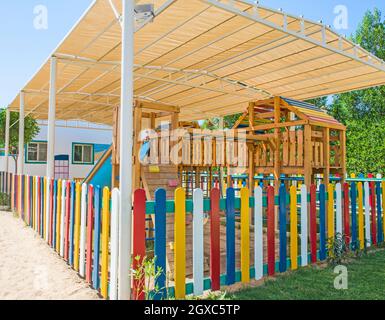 Large wooden climbing frame structure in children's playground area of luxury hotel Stock Photo