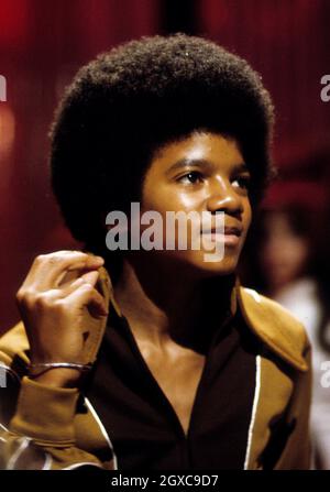 A young Michael Jackson performs live on stage with the Jackson 5, circa 1974 Stock Photo