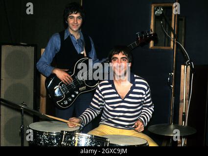 Briitish musicians David Essex (left) and Keith Moon on the set of the film Stardust, directed by Michael Apted. Stock Photo