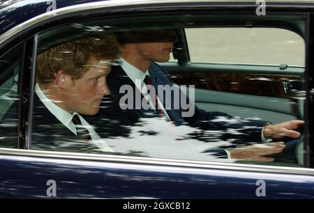 Prince Harry (left) and Prince William arrive by car for the 10th anniversary memorial service for Diana, Princess of Wales held at the Guards Chapel in London. Stock Photo