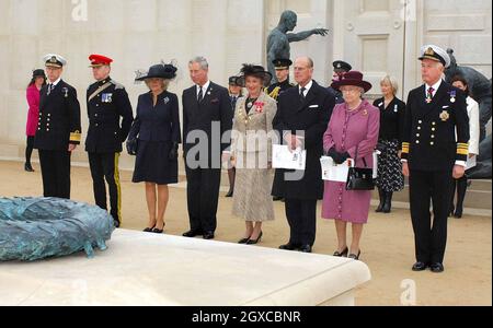 Queen Elizabeth II, accompanied by Prince Philip, Duke of Edinburgh, Prince Charles, Prince of Wales and Camilla, Duchess of Cornwall, attend the dedication ceremony for the the new National Armed Forces Memorial at Alrewas in Staffordshire. Almost 16,000 names are carved on the vast Portland Stone walls, paying tribute to those who have given their lives in service of their country since 1948. Stock Photo