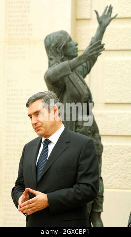 Britain's Prime Minister Gordon Brown attends the dedication ceremony for the the new National Armed Forces Memorial at Alrewas in Staffordshire. Almost 16,000 names are carved on the vast Portland Stone walls, paying tribute to those who have given their lives in service of their country since 1948. Stock Photo