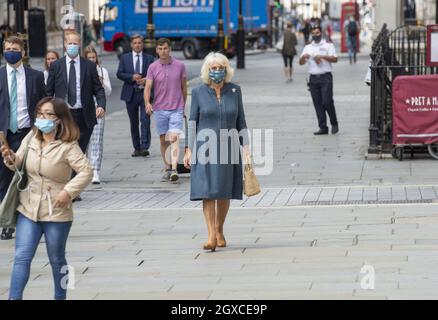 The Duchess of Cornwall is seen wearing a peacock-patterned face mask as she visits the recently re-opened National Gallery in London on July 28, 2020 Stock Photo