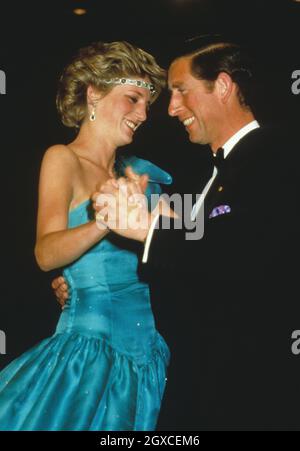 Princess Diana wears an Emanuel dress while dancing in Australia with Prince Charles Stock Photo